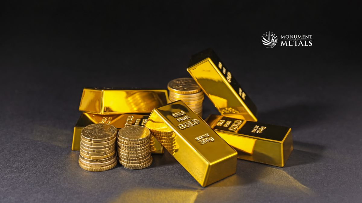 Gold bars and coins on surface 
