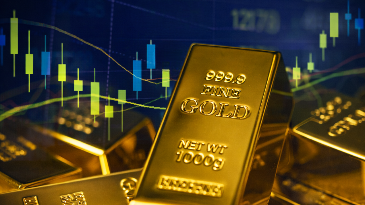 Gold bars with a financial market chart in the background illustrating gold prices and market movements.