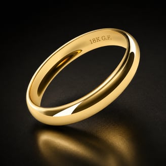 Gold-toned ring stamped 18K G.F. indicating gold-filled construction, not solid gold
