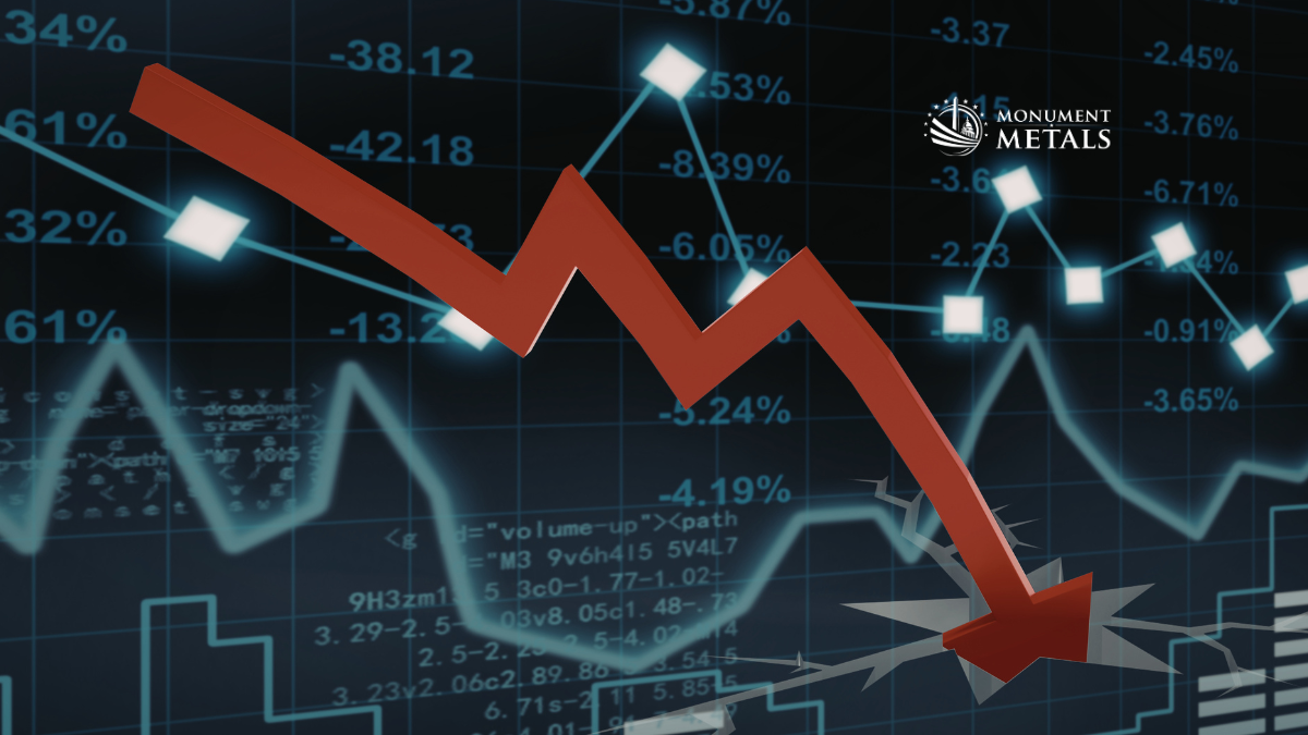 Gold and silver prices falling with red downward arrow over stock market chart, illustrating precious metals market drop and volatility