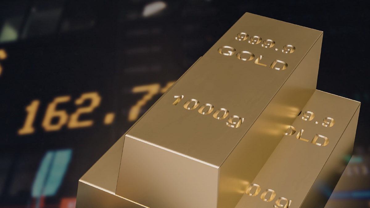 Gold bars labeled 999.9 fine gold with a market price chart in the background representing gold prices and financial markets.
