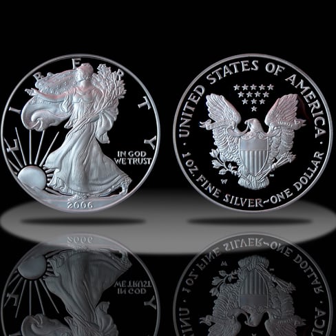 Proof american silver eagles in a black background