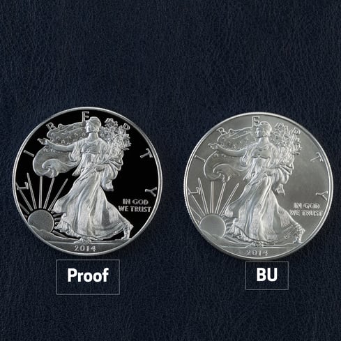 Side by side comparison of proof and brilliant uncirculated American Silver Eagles in a black background